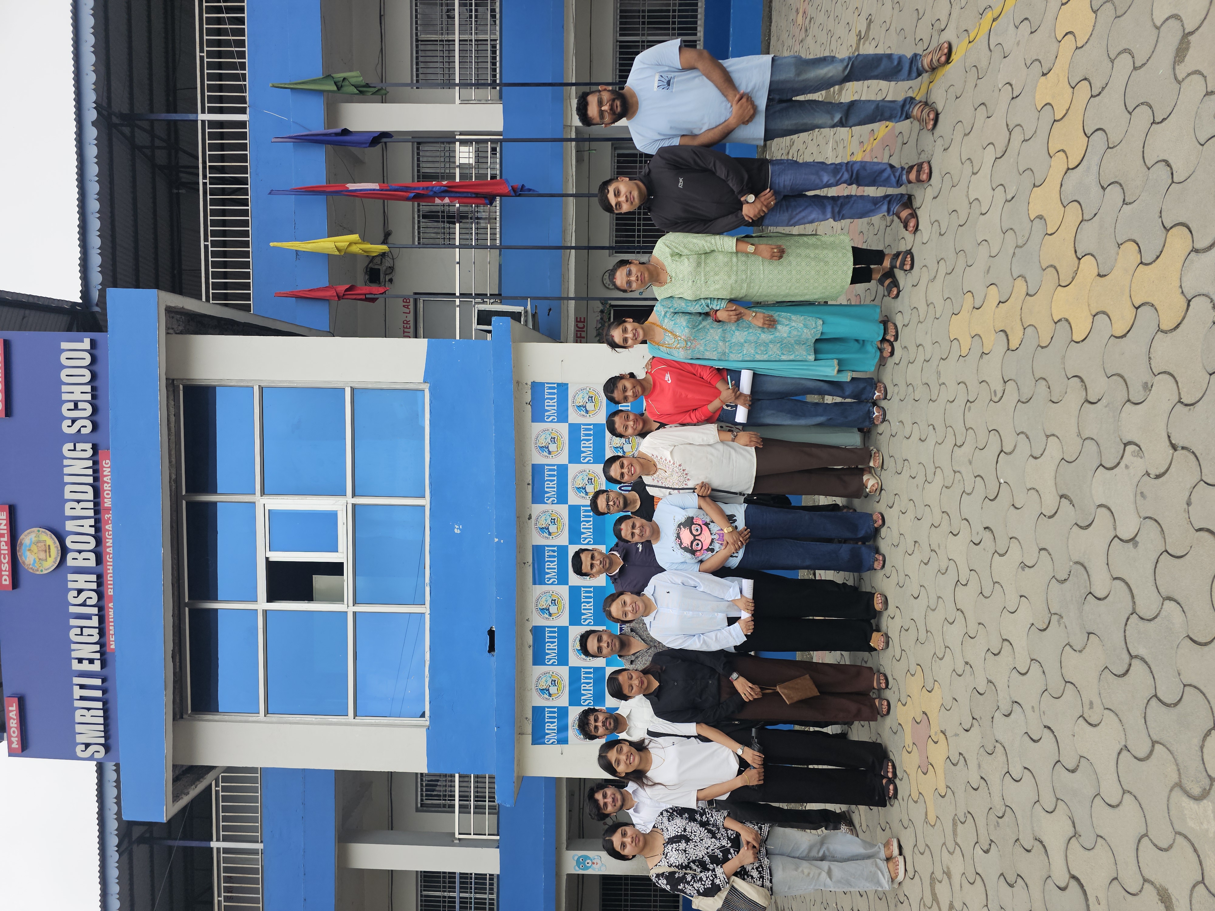 Group selfie with students
